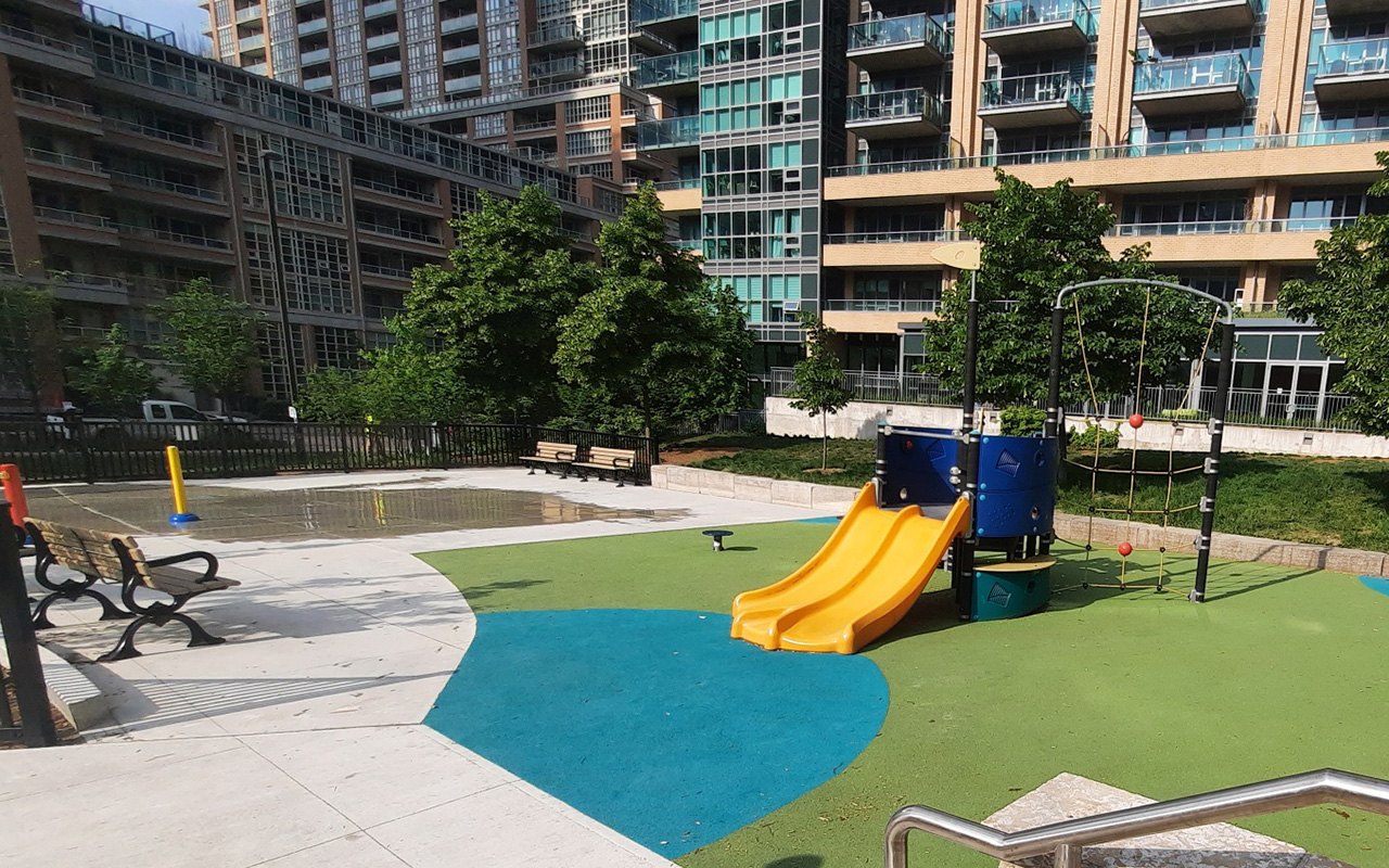 The playground and splash pad at Liberty Village Park.