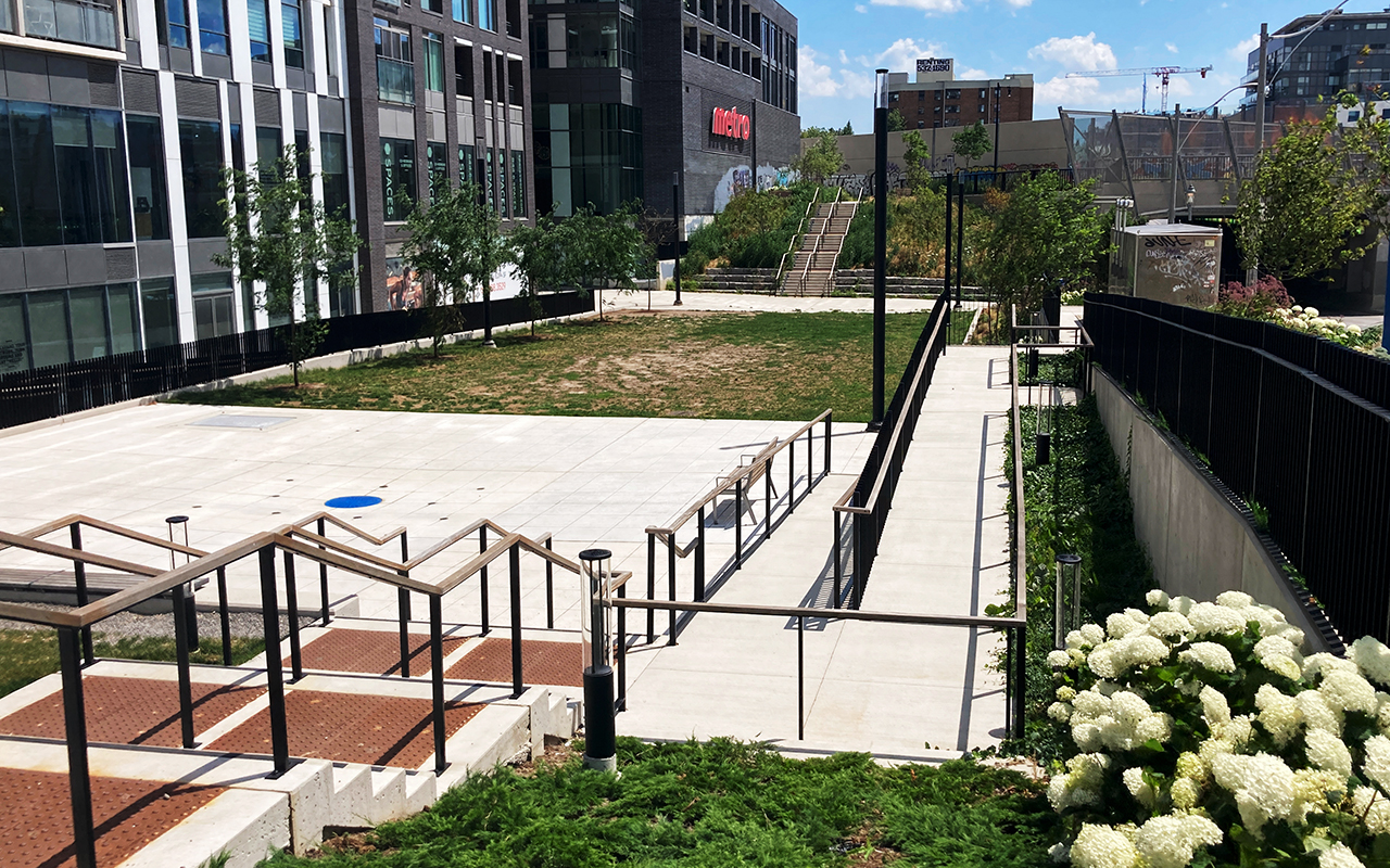Accessible access to splash pad and lower lawn of Pessoa Park