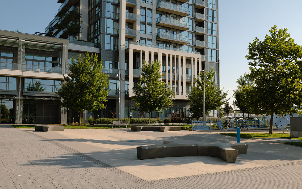 A splash pad with rock seating.