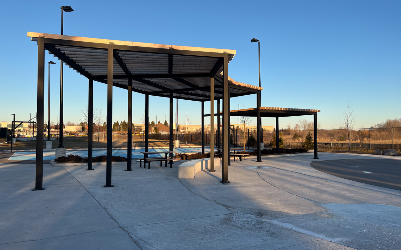 The shade structure beside the splash pad in Joyce Trimmer Park