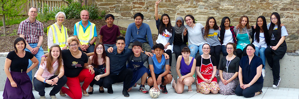 group of diverse people pose for a picture