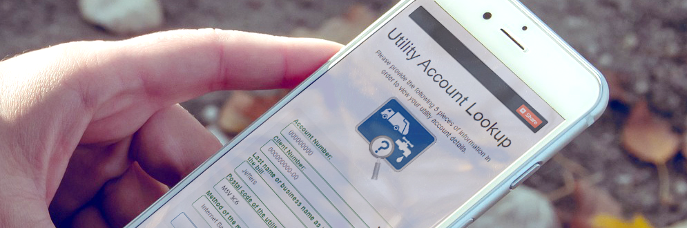 picture of a cell phone displaying the Utility Account Lookup online tool.