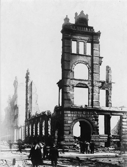 A four-storey section of a wall above the Bay Street entrance to the Wyld-Darling building remains after the fire. The rest of the upper-storey walls are gone.