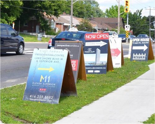 Development signs are used for new building developments, such as condos or new homes.