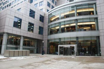 Glass entrance into Metro Hall from Wellington St. W.