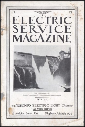 Magazine cover showing hydroelectric dam.