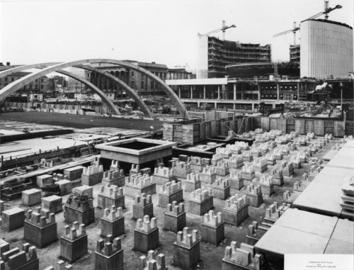 Nathan Phillips Square and reflecting pool under construction showing pillars for underground parking garage