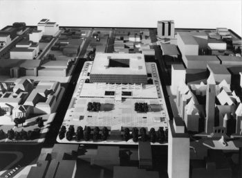 Model of square building with courtyard hole in centre