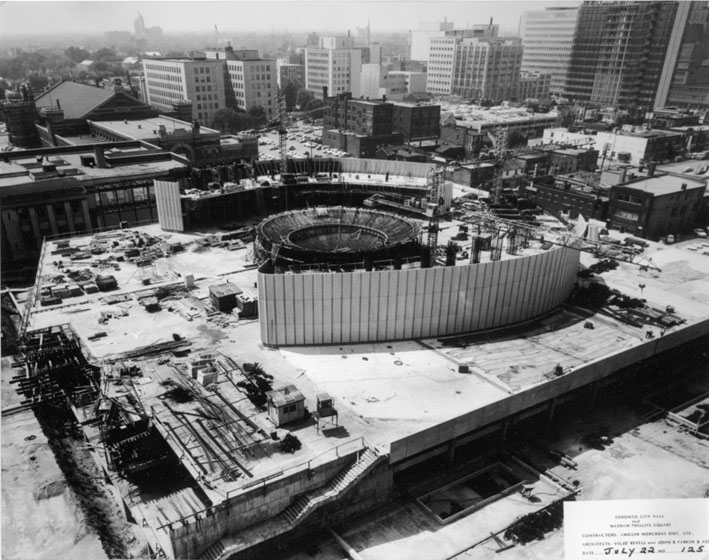 City Hall under construction seen from the air, with only a few storeys and part of the central rotunda built