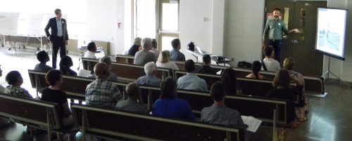 An audience views a presentation at the June 2016 Keele Finch Plus consultation