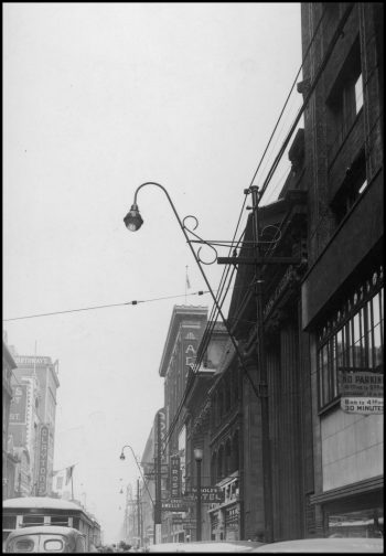 Street lamp affixed to building