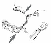 hand holding breast squeeze breast gently to encourage baby sucking