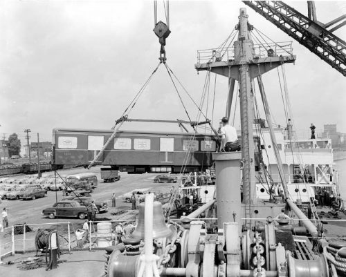 Subway car hoisted from ship