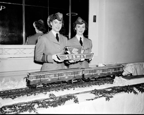 TTC employees with subway cake