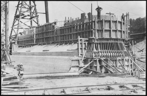 Large oval mould made of wood to shape poured concrete.