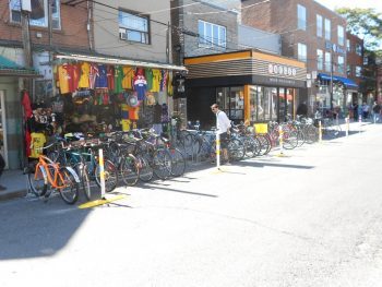 A vertically staggered bike rack