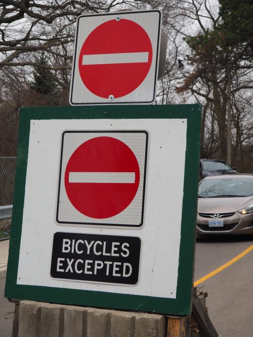 Bicycles excepted sign. Noting that vehicles cannot go forward but there is a contraflow lane for cyclists.