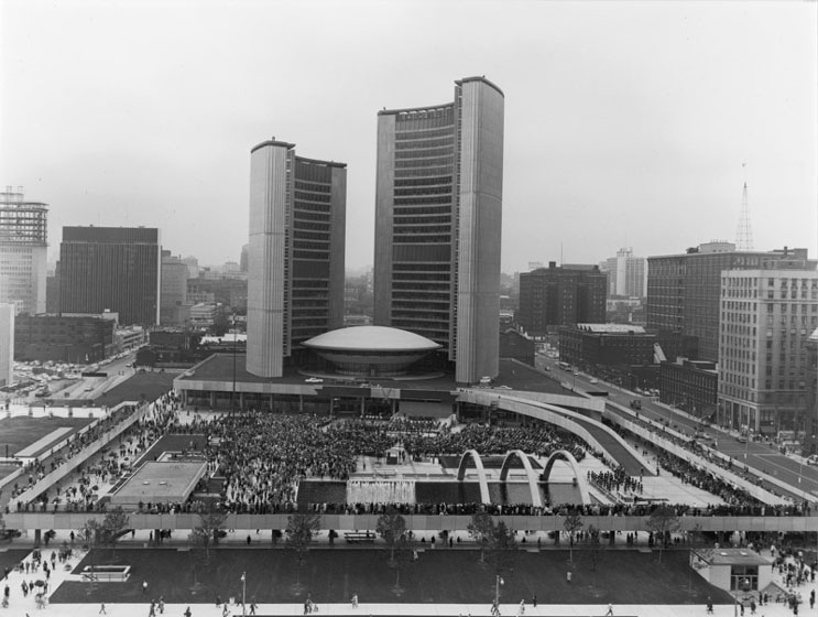 View of City Hall from the south, with Nathan Phillips Square full of people