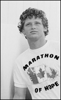 A picture of Terry Fox wearing a t-shirt saying Marathon of Hope