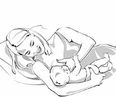 woman breastfeeding baby in side lying position