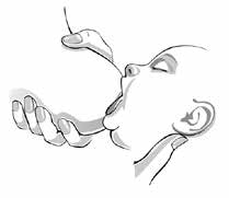 hand holding breast and baby latching on breast