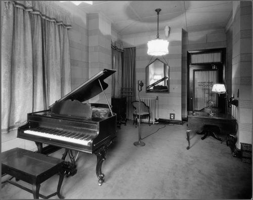 Piano and microphone in recording room, King Edward Hotel