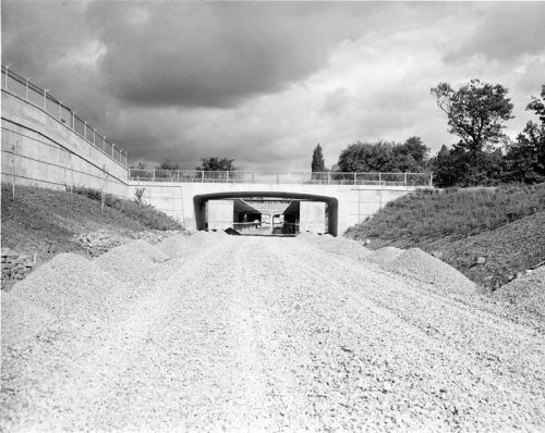 Retaining wall and gravel bed for track