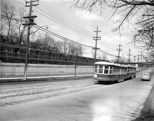 Subway test run, with Yonge Street streetcar in foreground