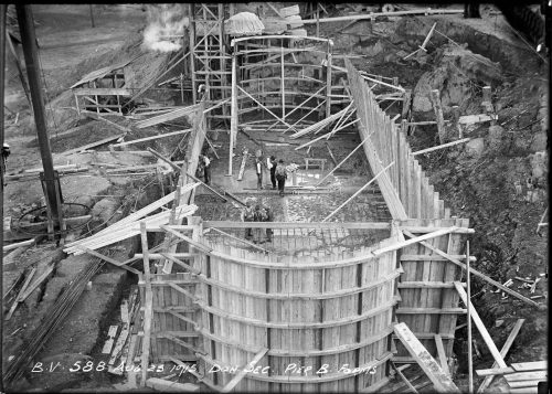 Large oval mould made of wood to shape poured concrete.