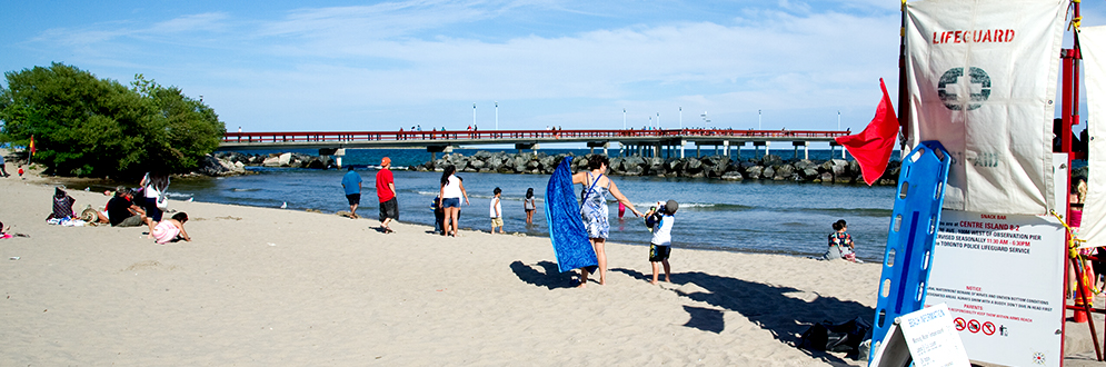 A beach in Toronto, showing the lifeguard chair, during summer