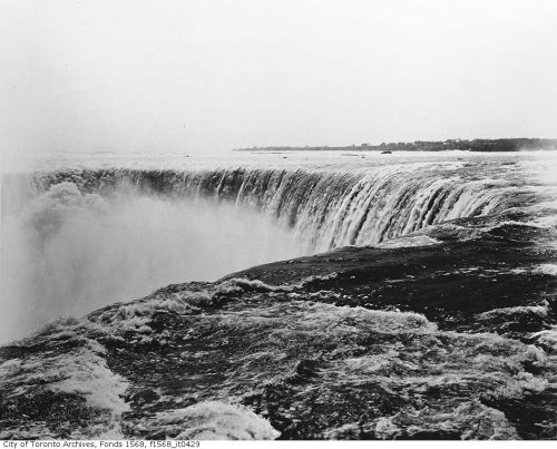 Closeup to water going over Niagara Falls.