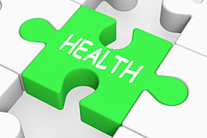 An image with a green puzzle piece labeled with the word Health.