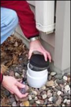 Placing a cap on the exposed sewer standpipe.