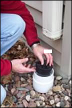 Sewer standpipe being secured with a cap.