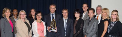 Image of award winners. Photo from left to right: Manal Ishak, Bernadette Nanton, Wendy Quaintance-Collier, Sara Jackson, Lan Nguyen, Casey Brendon, Peter Wallace, Uni Hwa Young Oh, Johan Macedo, Rob Williams, John Longarini, Jill Delen, Carmela Romano