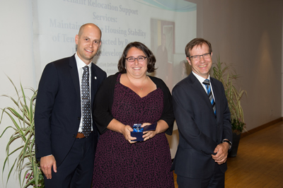 Image of award winners. Left to right: Jeremy Kloet (City Planning), Alexandra Vamos (SSHA), Peter Wallace (CMO)