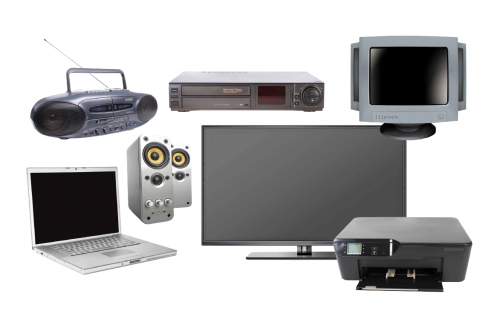 Group of large electronic waste items. Includes a TV, VCR, laptop, computer monitor, printer, stereo, and speakers.