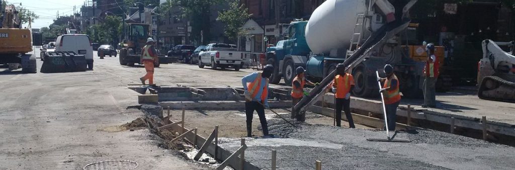 Image of City crews paving an arterial road