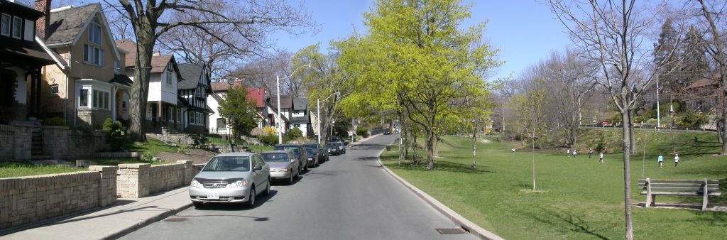 Image of cars parked on a residential street