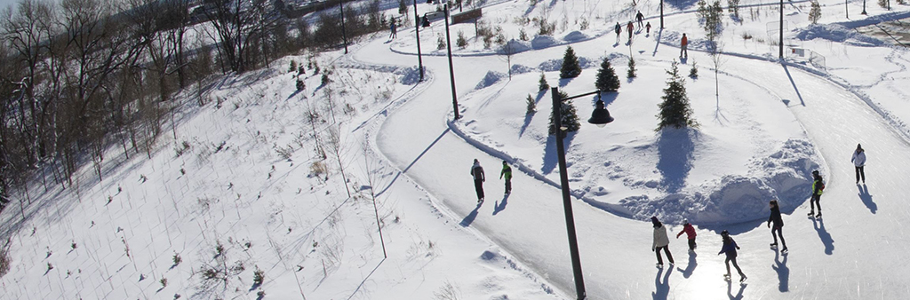 An aerial view of people skating on an outdoor skate trail