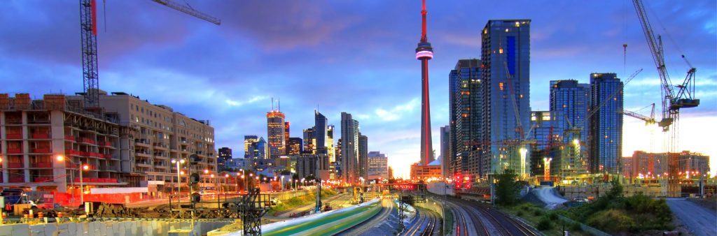 Construction cranes in the sky in downtown Toronto