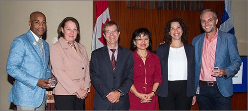 Customer experience category award winners for the Making Registration Better project. Left to right: Rob Meikle, Ann Ulusoy, Peter Wallace, Lan Nguyen, Brenda Fideles and Howie Dayton.