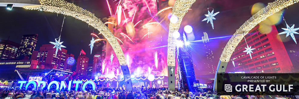 Photo of Nathan Phillips Square at night during Cavalcade of Lights fireworks show.