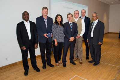 Image of award winners. Left to right: Gary Thompson, Henry Polvi, Rose Hosseinzadeh, Peter Wallace, Mark Clancy, Mike Brannon, William Fernandes