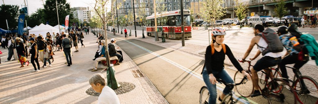 Image of Queens Quay, showing cycling, transit and walking