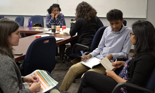 Image of youth involved in a discussion in a classroom