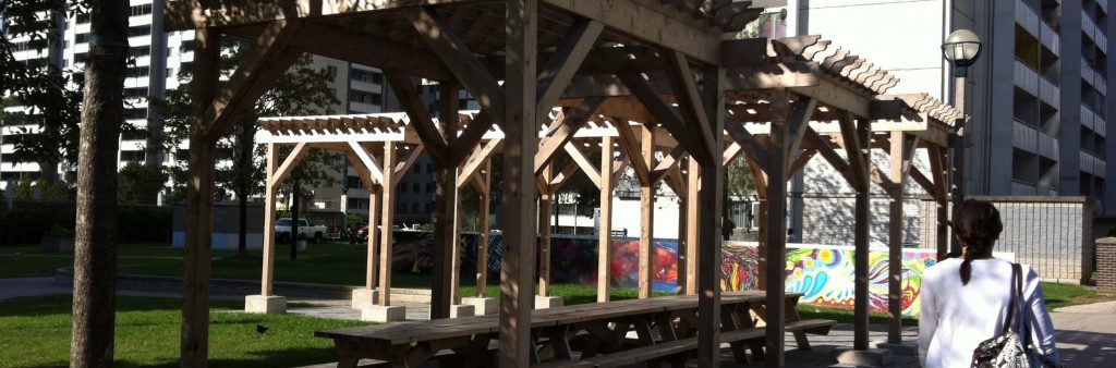 New pergola tables and mural in St James Town tower neighbourhood.
