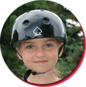 picture of a children wearing a multiple-impact helmet