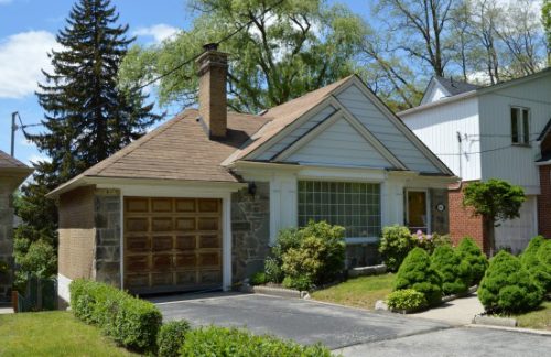 This is a photograph of a Minimal Traditionalist style house in Old Millside