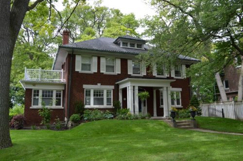 This is a photograph of a Colonial Revival style house in Baby Point